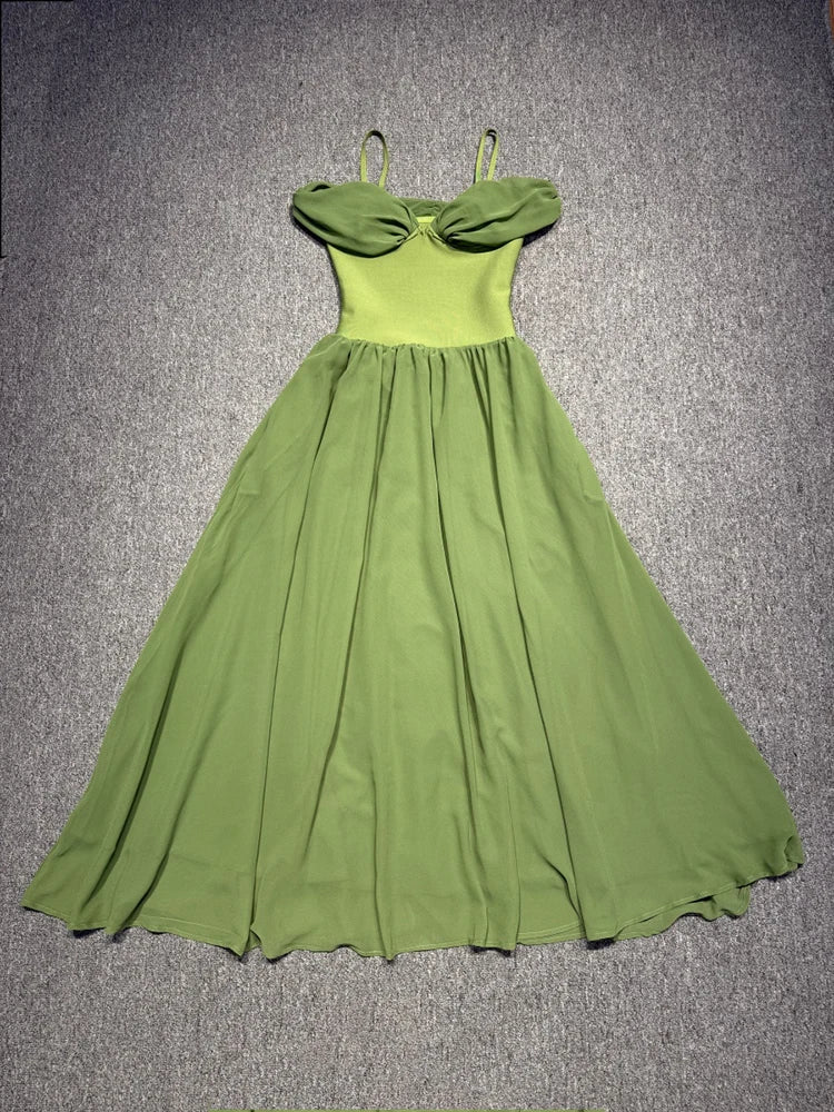 Green dress on a textured gray background