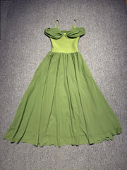 Green dress on a textured gray background