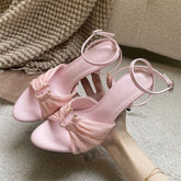 Pink stiletto heel sandal with ruched mesh and ankle strap