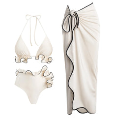 Cream ruffled halter bikini top and high-waist bottoms with a matching ruffled wrap skirt featuring contrast trim.