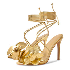 Gold flower stiletto wrap sandals studio shot