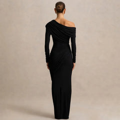 Black one-shoulder evening gown on a neutral background