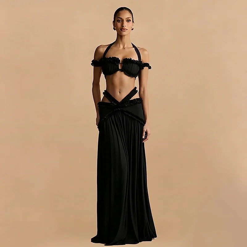 Black halter ruffle crop top and cutout maxi skirt front view