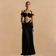 Black halter ruffle crop top and cutout maxi skirt front view