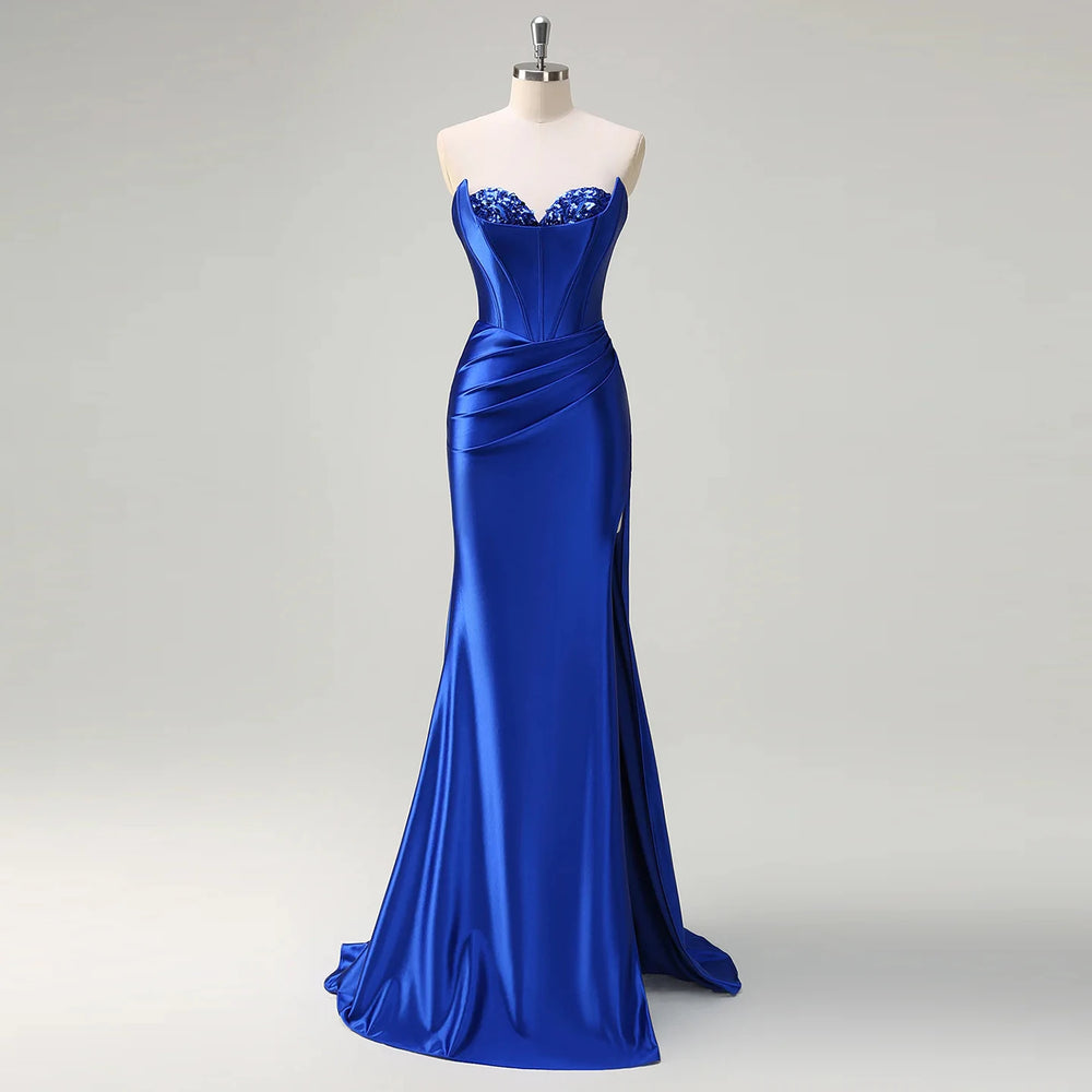 Blue evening gown on a mannequin against a gray background