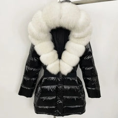 Black puffer jacket with a large white fur collar