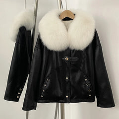 Black leather jacket with white fur collar on a hanger against a plain background