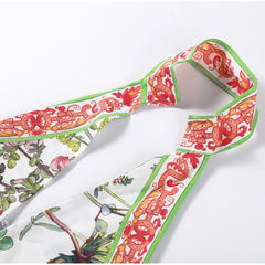 Decorative ribbon with intricate patterns on a white background