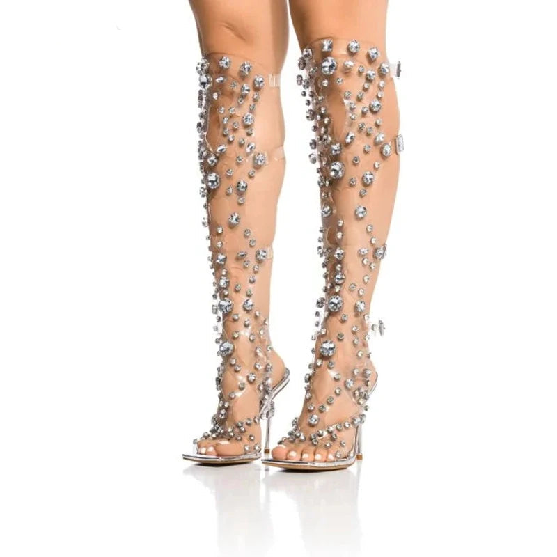 Elevated knee-high sandals with crystal embellishments