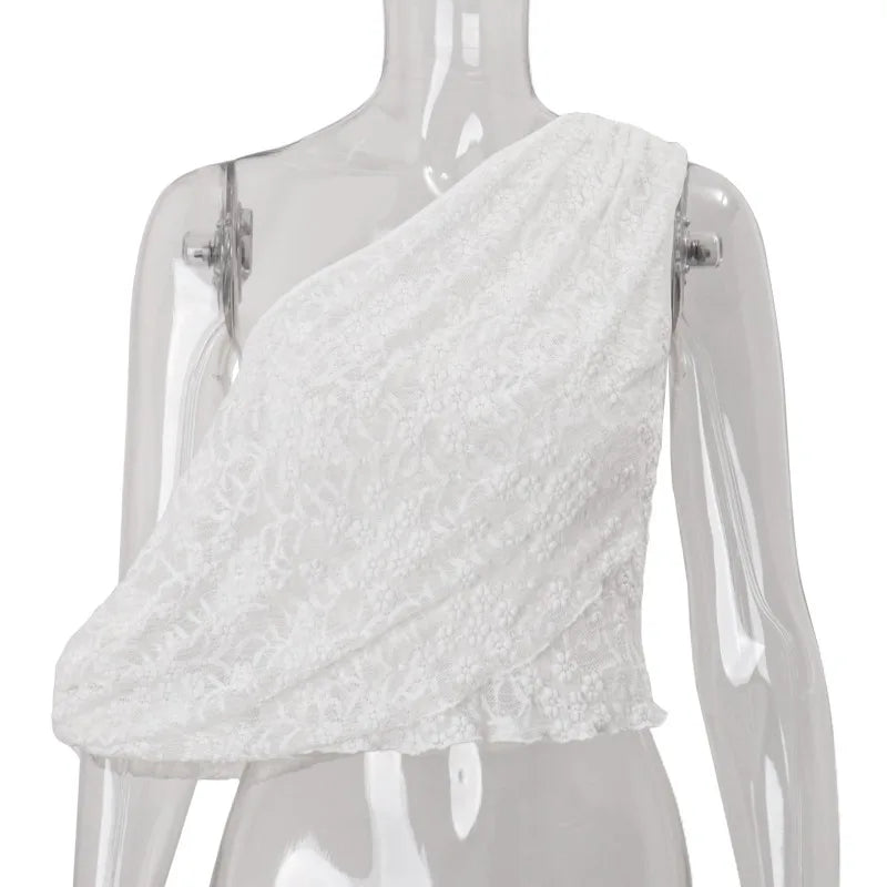 White one-shoulder textured top on a mannequin against a white background