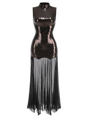 Black sequin dress with sheer overlay on a white background