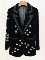 Black velvet blazer with beaded bee embellishments and ribbon lapels.