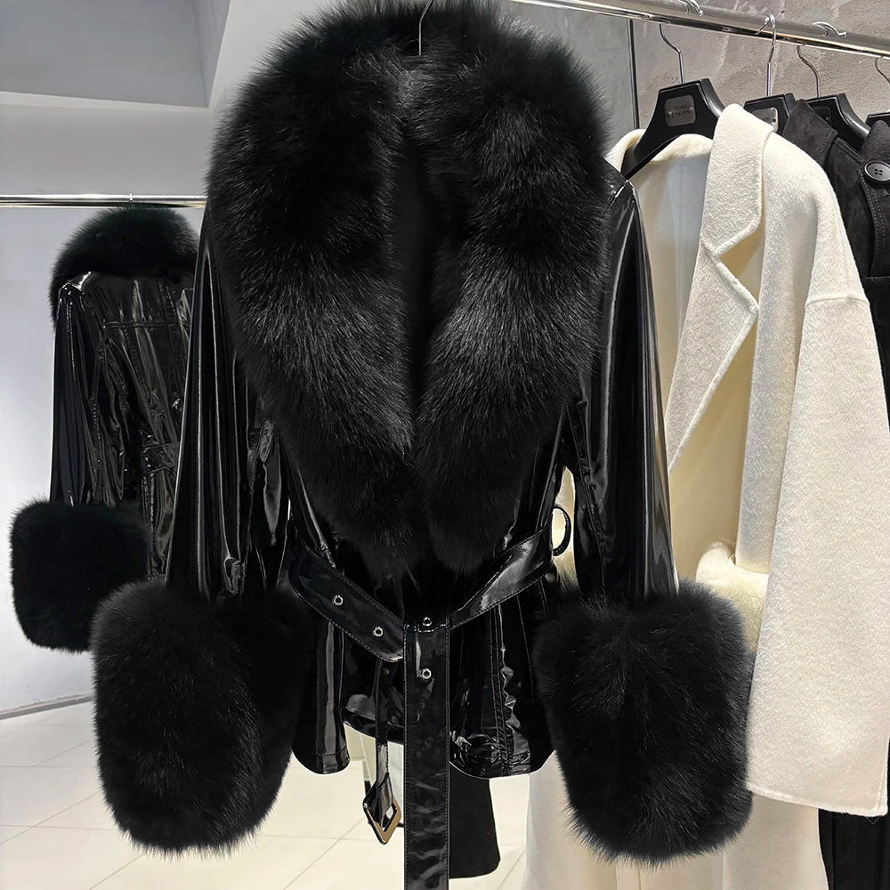 A black fur coat hanging on a rack.