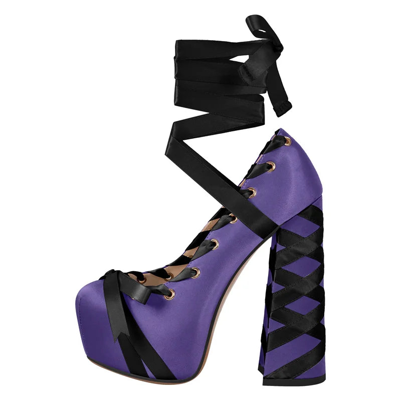 Purple platform shoe with black ribbon and geometric pattern on a white background