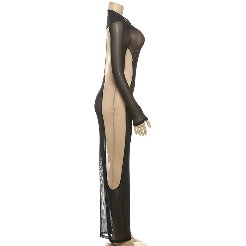 Mannequin wearing a black and beige dress with sheer panels