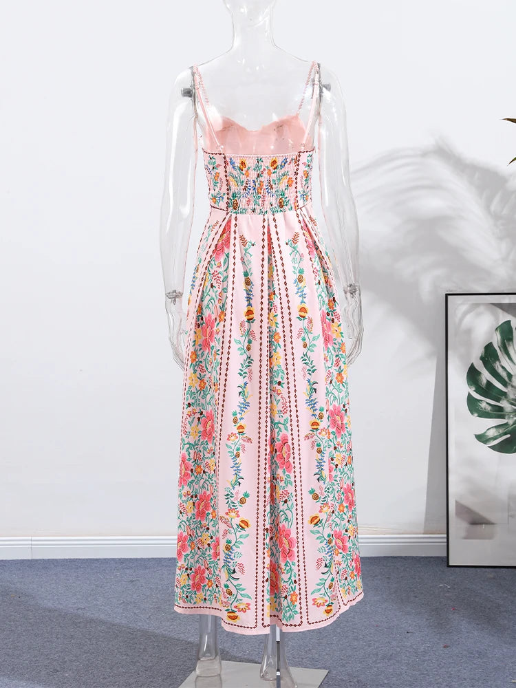 Floral dress on a mannequin against a white background