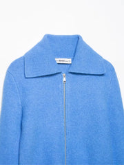Blue sweater with a zipper on a white background