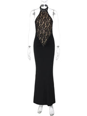 Black evening gown with lace detailing on a mannequin against a white background