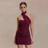Burgundy crystal embellished halter neck mini dress with side ruching.