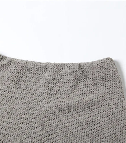 Gray textured fabric on a white background