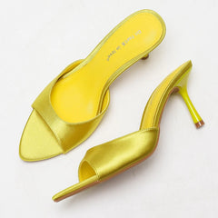 Yellow satin pointed toe stiletto mules profile view