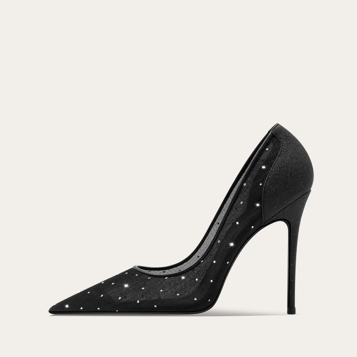 Black high-heeled shoe with sparkling details on a light gray background