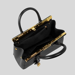 Open view of the structured lock top handle bag interior.