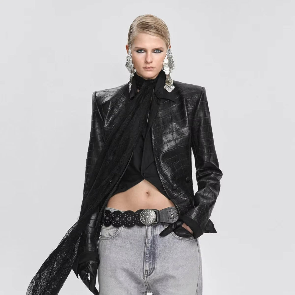 Model wearing an embossed faux leather fitted blazer