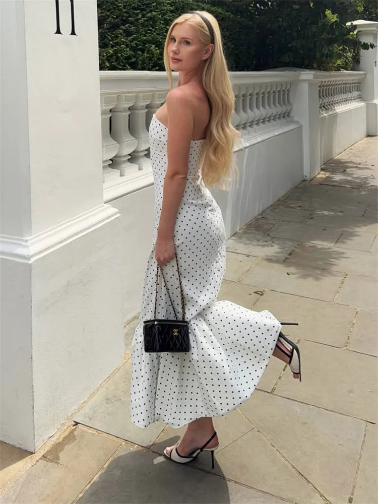 Polka dot strapless mermaid dress pose