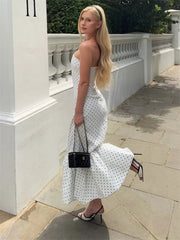 Polka dot strapless mermaid dress pose