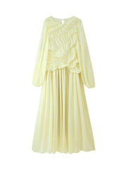 Light yellow dress with floral details on a white background