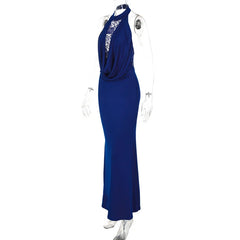 Blue evening gown on a mannequin against a white background