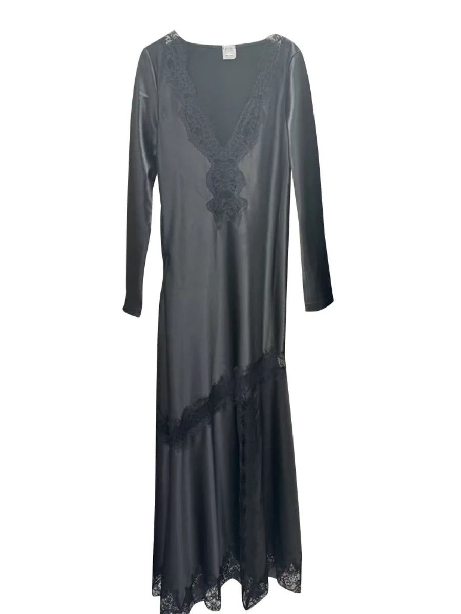 Long-sleeve dress with lace detailing on a white background