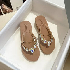 Beige embellished wedge flip flops with clear and iridescent stones