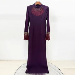 Purple maxi dress with beaded neckline and flare sleeves displayed on a hanger