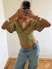 V-neck striped knit cropped top with dolman sleeves and ruched front