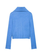 Blue sweater on a white background