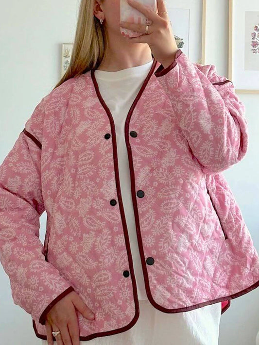 Quilted jacket with pink paisley print and dark contrast trim
