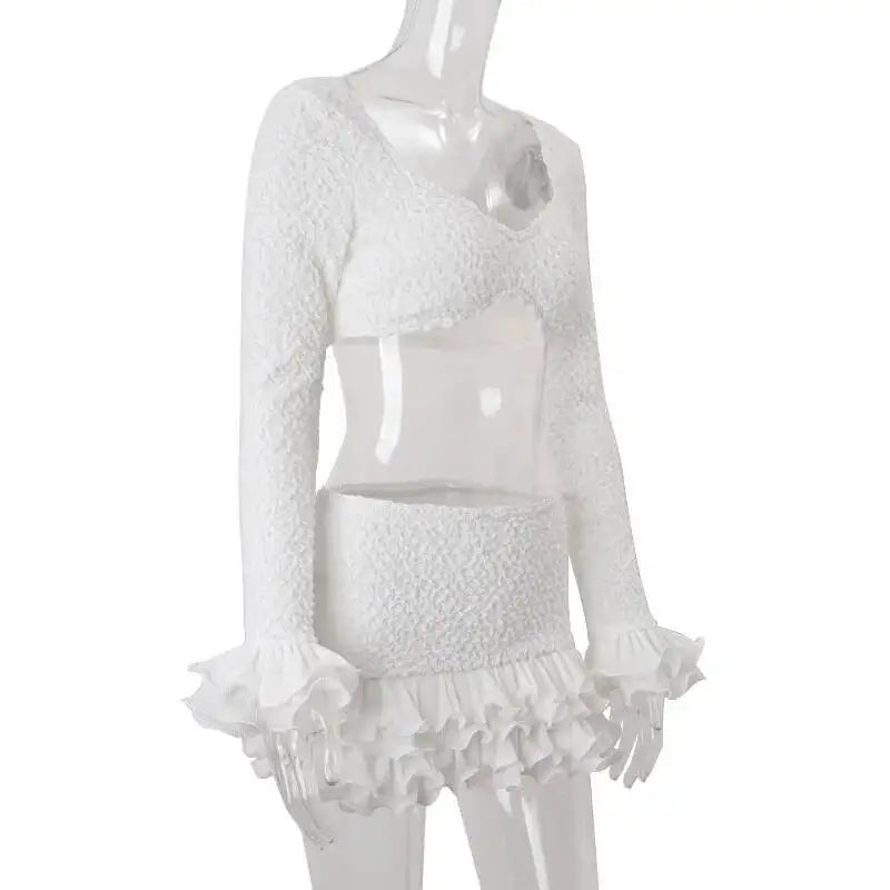 White textured top and skirt set on a mannequin against a white background