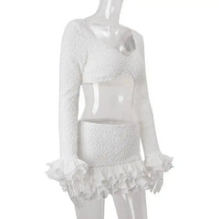 White textured top and skirt set on a mannequin against a white background