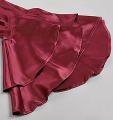 Maroon satin fabric on a light gray background
