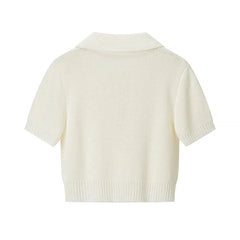 White knitted cardigan on a white background