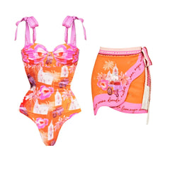 Orange and pink multi-print sweetheart neckline one-piece swimsuit with tie straps and matching sarong with fringe