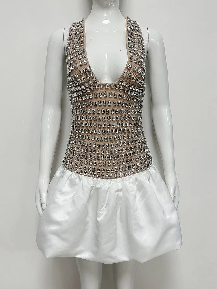 Crystal embellished halter mini dress on mannequin, front view