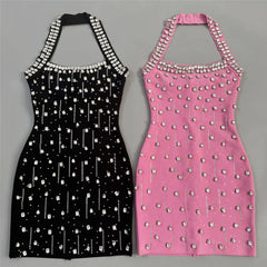 Black and pink embellished halter neck mini dresses side-by-side