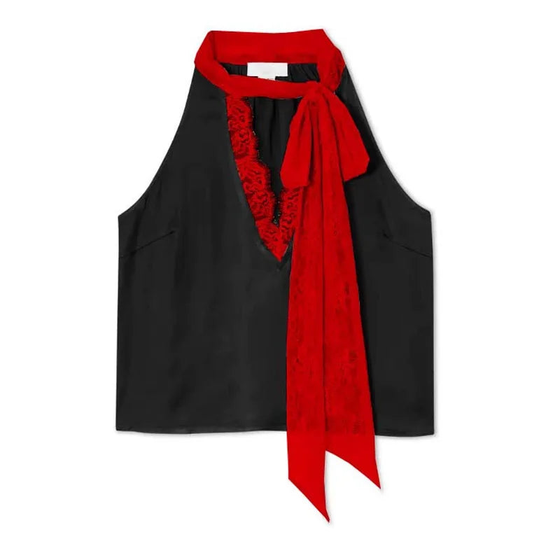 Black halter top with a long red scarf tied around the neck on a white background