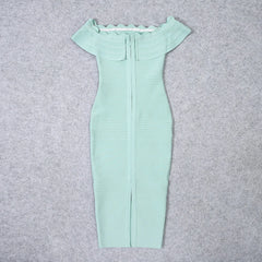 Mint green dress with short sleeves on a gray background