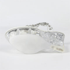 Silver ring with a clear gemstone on a white background