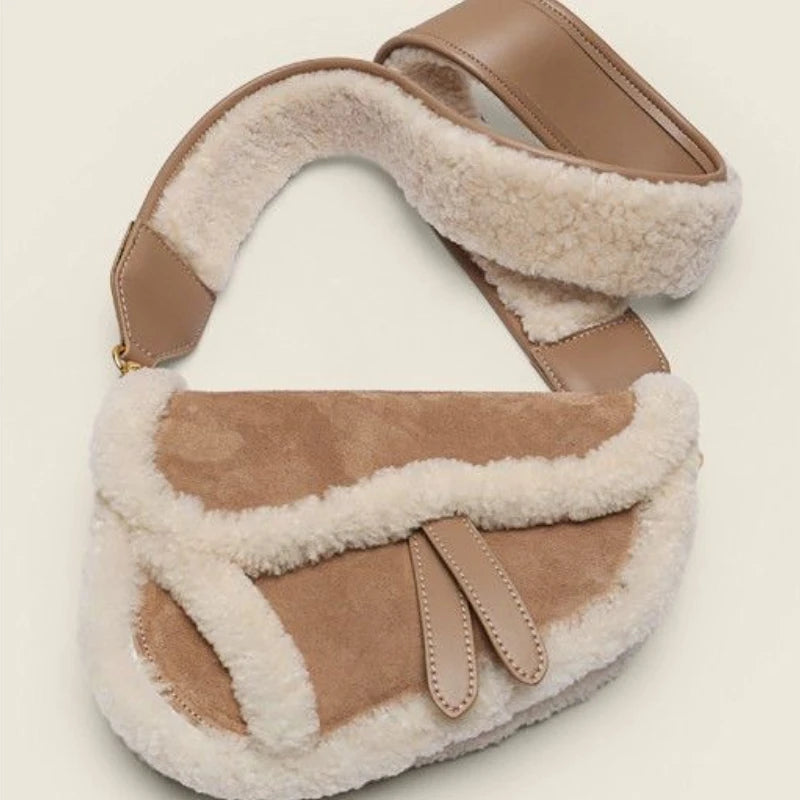 Shearling trim saddle bag with wide strap