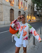 Quilted bomber jacket with oversized floral print